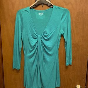 Ana turquoise green woman’s top.